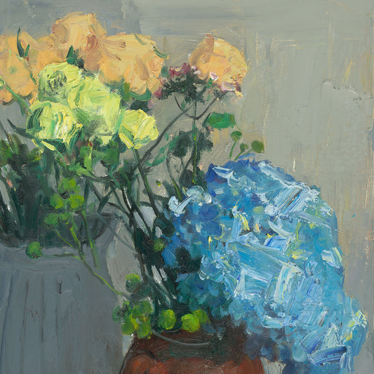 Close-up detail of a blue hydrangea bloom, highlighting layered petals, vibrant color relationships, and painterly texture.
