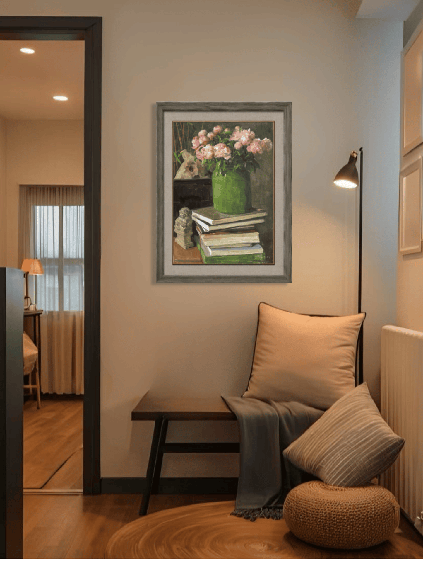 Original oil painting featuring books and pink flowers displayed in bedroom interior, enhancing calm, warmth, and personal character.