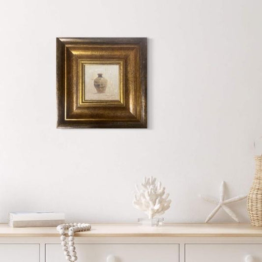 Small framed still life oil painting styled above a white mantel in a calm minimalist interior with soft neutral decor.