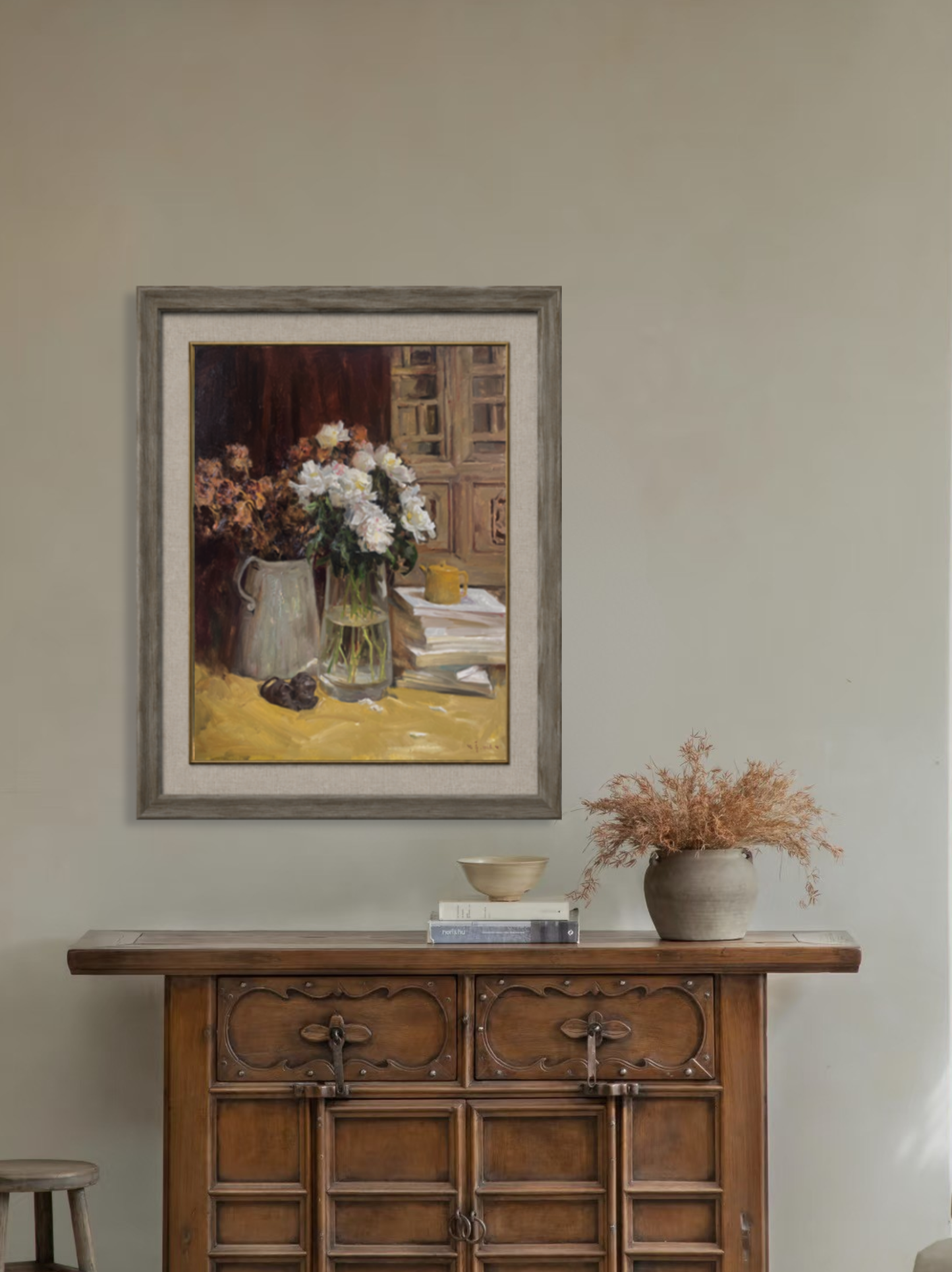 Original oil painting with books and flowers displayed in a reading room or study environment.