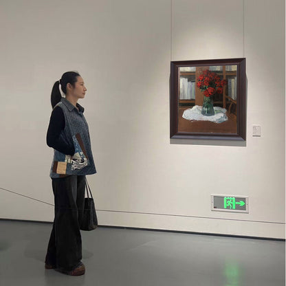 Red Roses by the Bookshelf