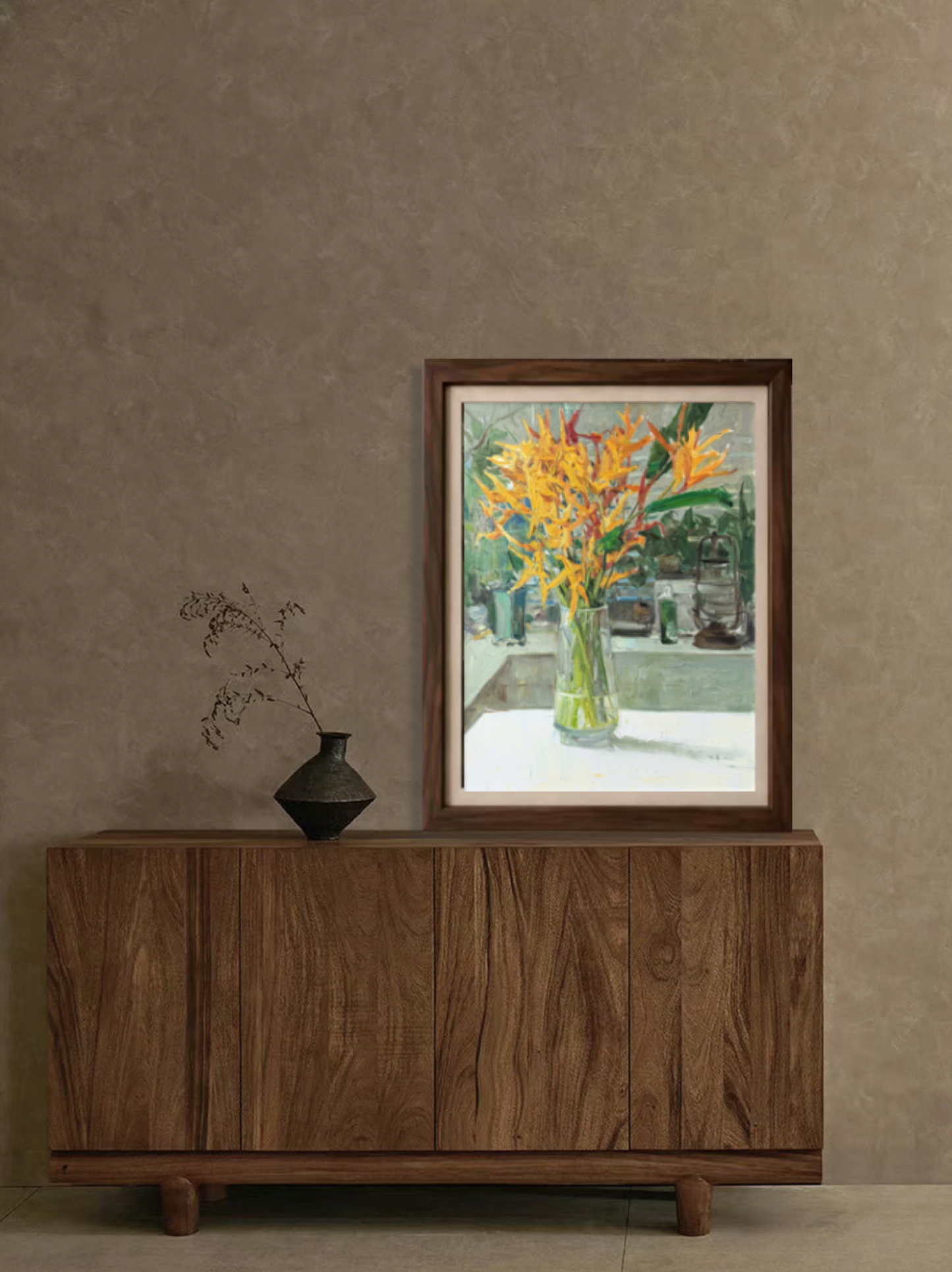 Framed original oil painting featuring Bird of Paradise flowers displayed in a contemporary interior, creating a vibrant focal point and natural elegance.