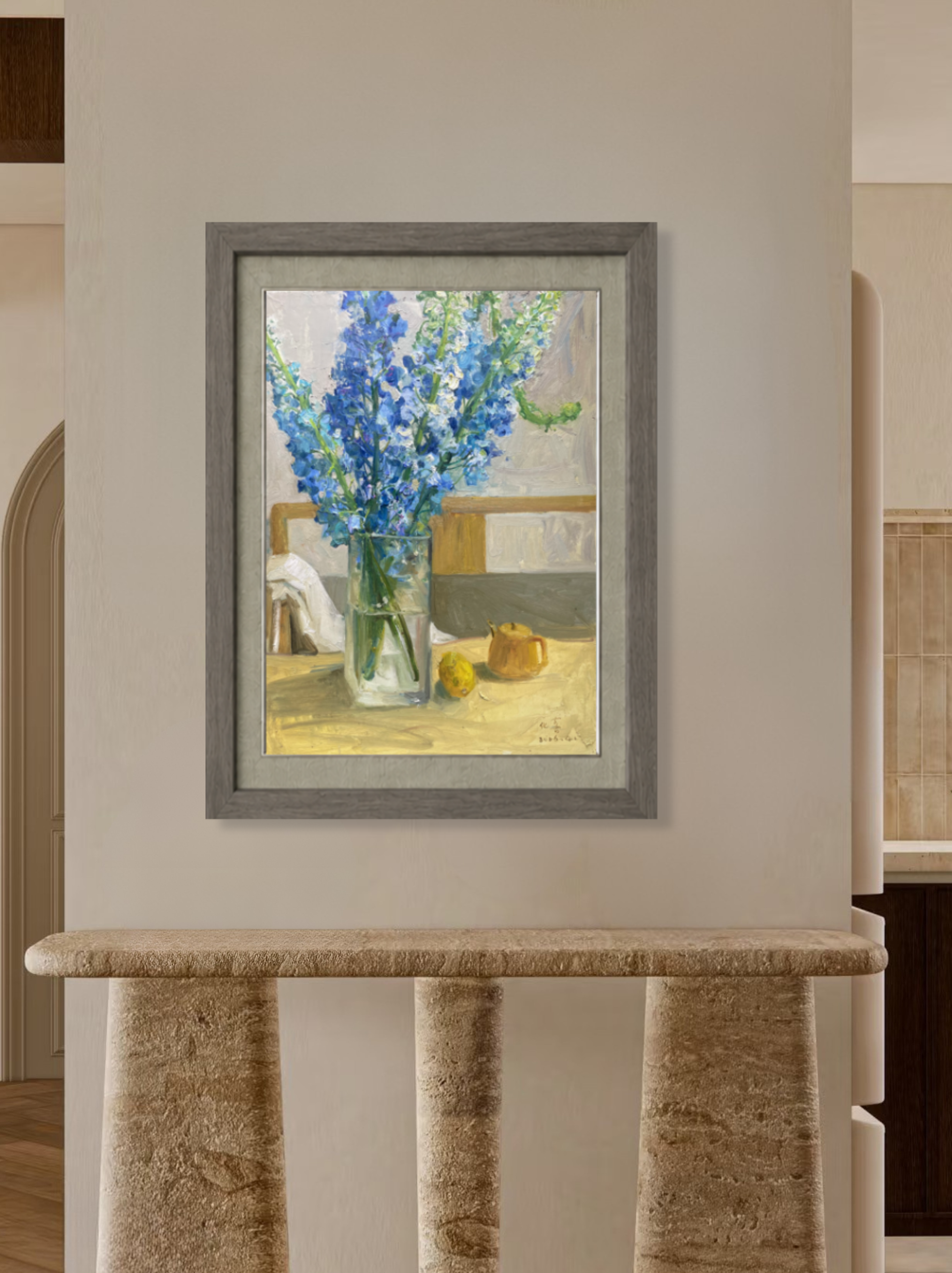 Framed oil painting featuring blue delphinium flowers displayed in a contemporary interior, creating a bright and sophisticated focal point.