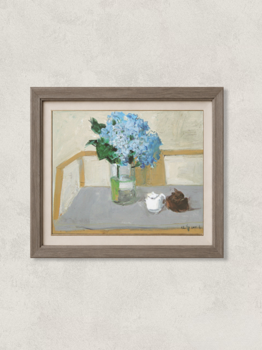 Original oil painting featuring a blue hydrangea arranged in a clear glass vase beside a small white vessel and natural decorative object. Painted by Hua Xi Yang with soft neutral tones and a calm contemporary still life atmosphere.