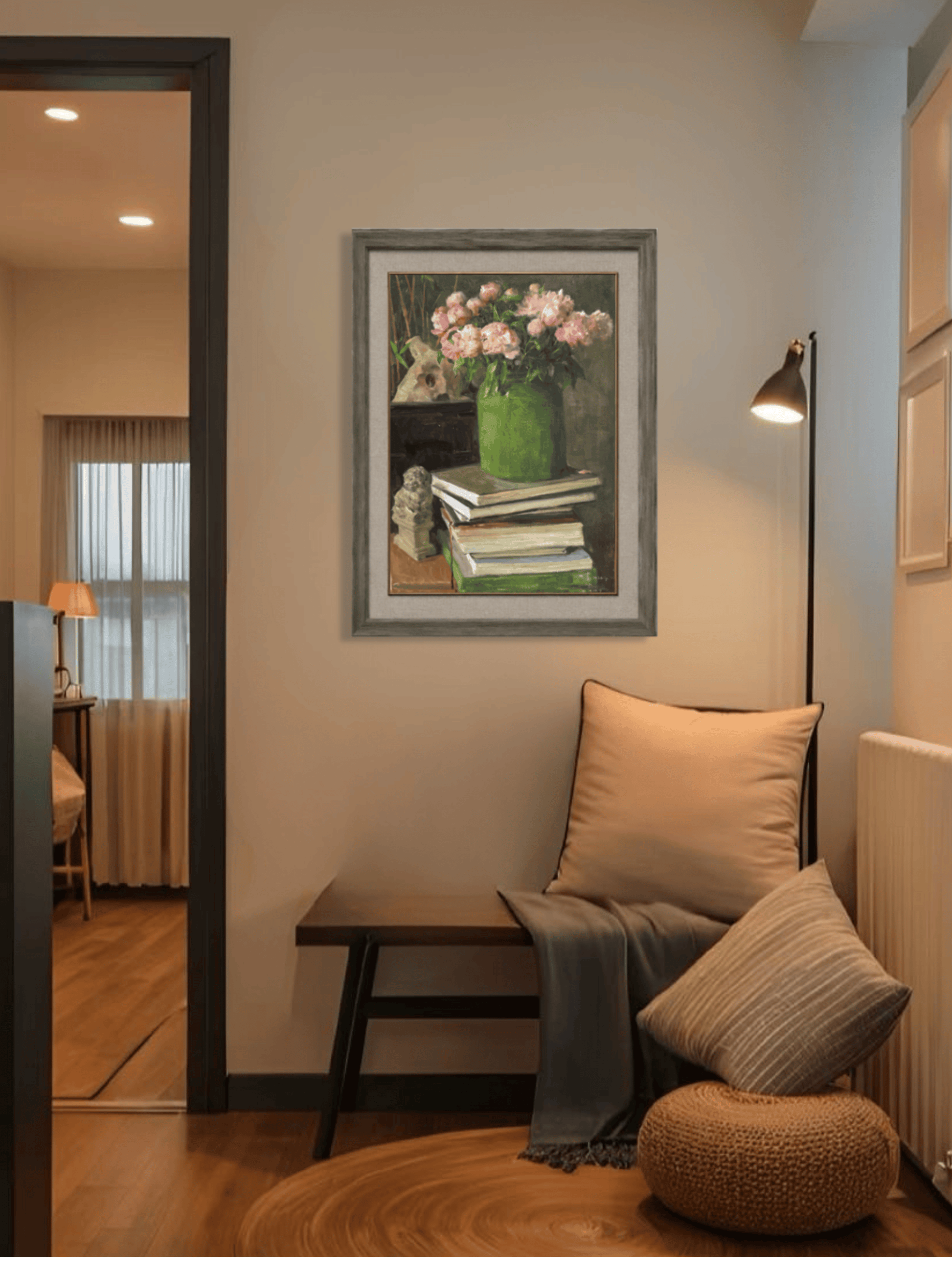 Original oil painting featuring books and pink flowers displayed in bedroom interior, enhancing calm, warmth, and personal character.