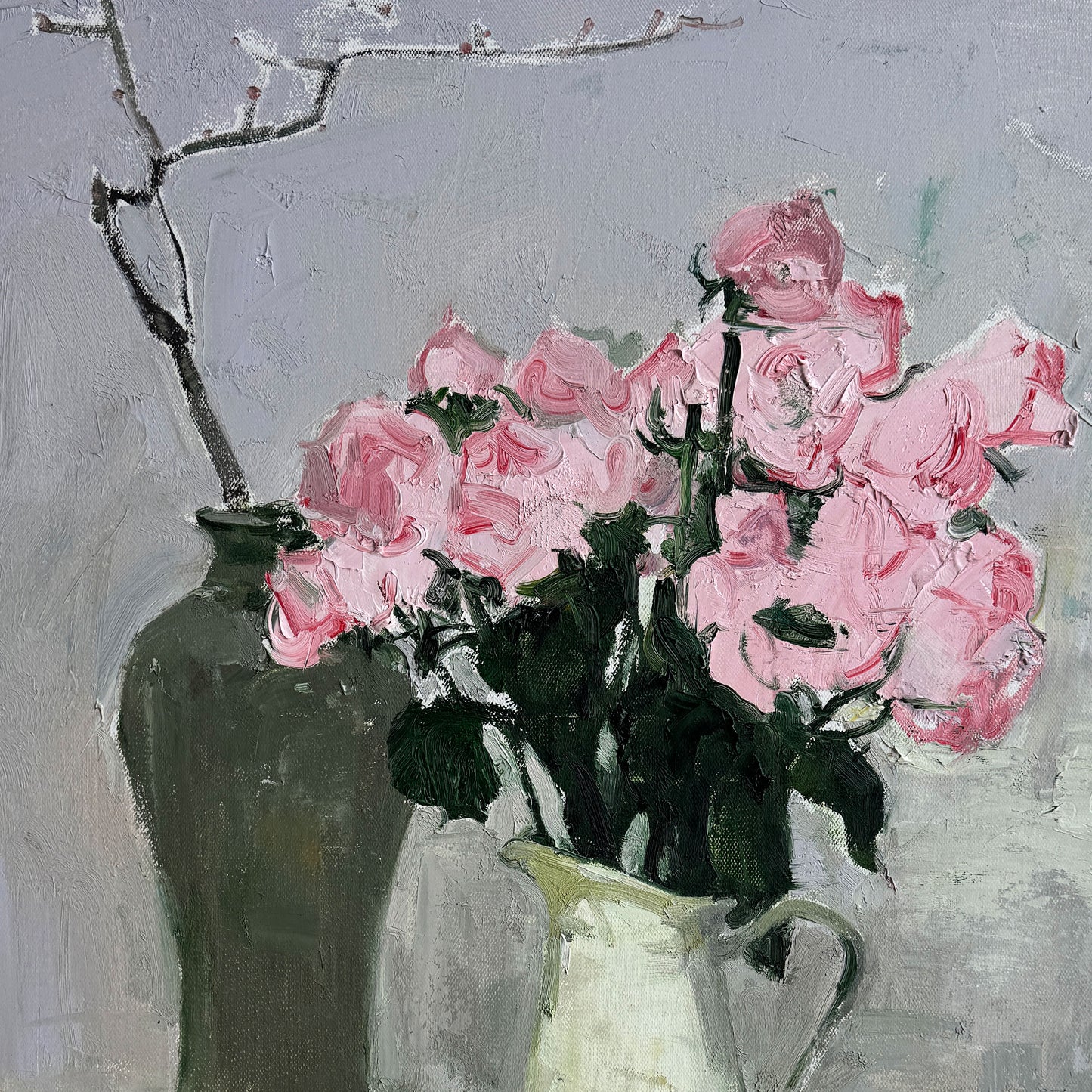 Close-up of the ceramic pitcher, dark vase, and extending branches, showing depth, reflections, and balance of still life composition.