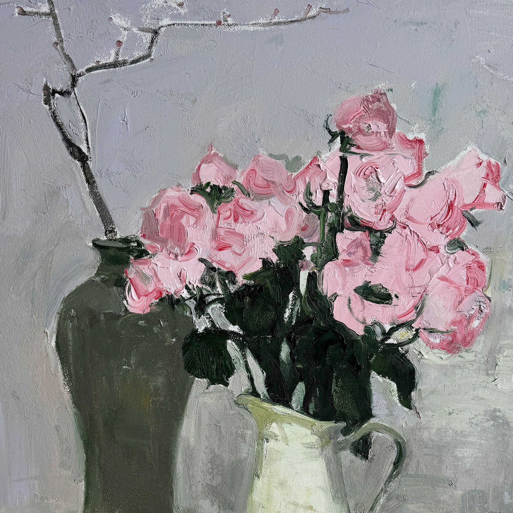 Close-up of the ceramic pitcher, dark vase, and extending branches, showing depth, reflections, and balance of still life composition.