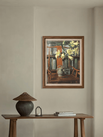 Original still life oil painting displayed on a neutral wall, bringing warmth, depth, and a quiet study-room feeling to the interior.