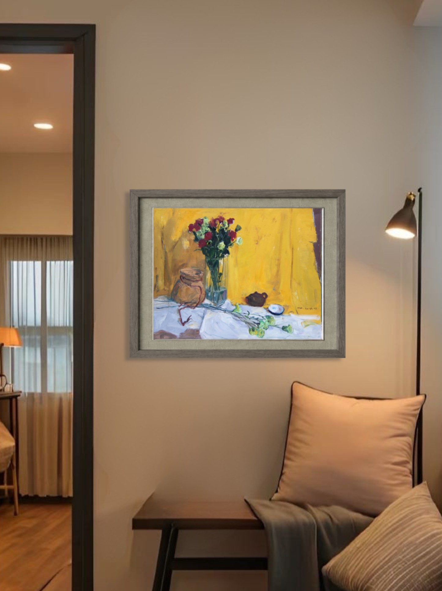 Original floral still life oil painting displayed in a contemporary living room, bringing warmth, color, and artistic character to the interior.