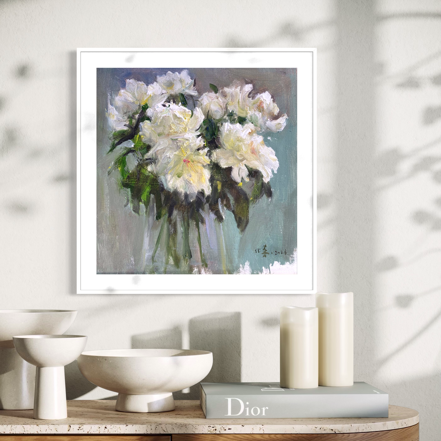 Original peony oil painting styled in a minimalist interior with warm neutral tones, layered ceramics, and contemporary decor.
