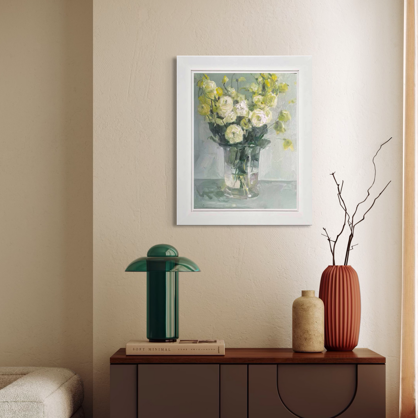 Original floral oil painting styled above a wooden cabinet with modern decorative objects in a calm and refined interior.