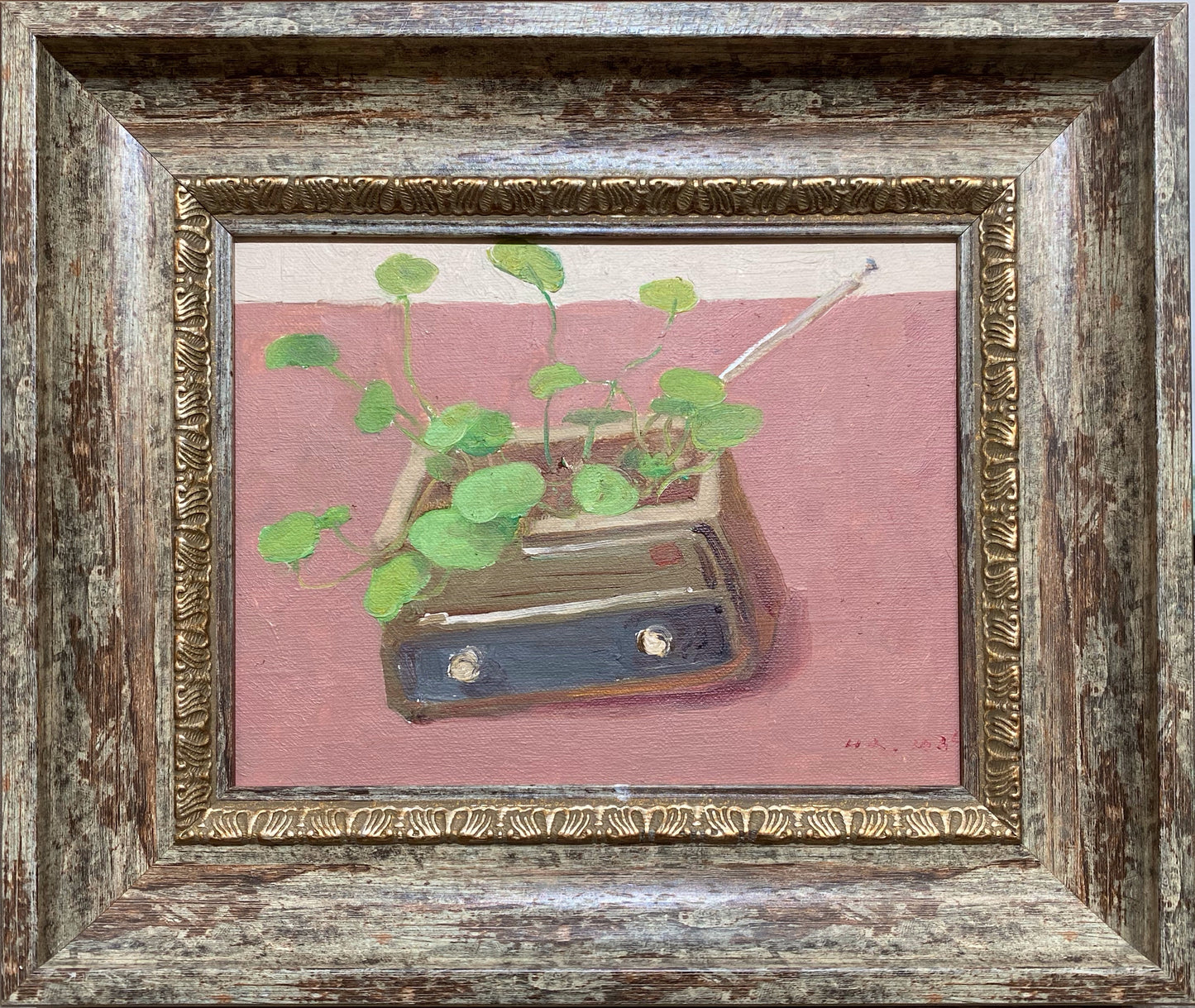 A small original oil painting featuring a green plant growing from a vintage ceramic pot. Framed and ready to hang, this botanical still life highlights soft color harmony and expressive brushwork.