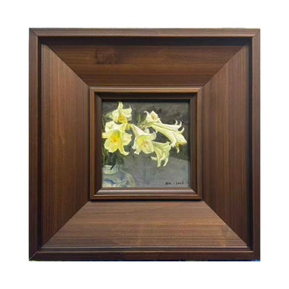 Small original oil painting of soft yellow flowers, presented in a deep walnut wood frame with a gallery-style shadow box structure and warm classical character.