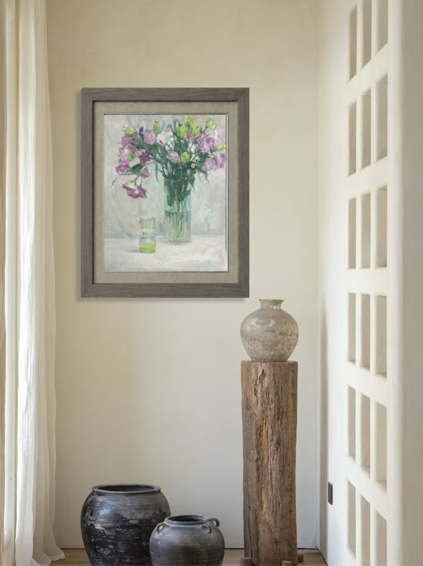 Framed original oil painting featuring purple sweet pea flowers displayed in a minimalist interior, complementing light-filled contemporary spaces.