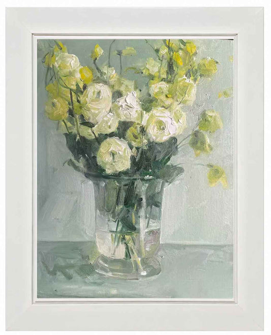 Original floral oil painting featuring white roses and pale green blossoms arranged in a glass vase, presented in a soft ivory gallery frame.