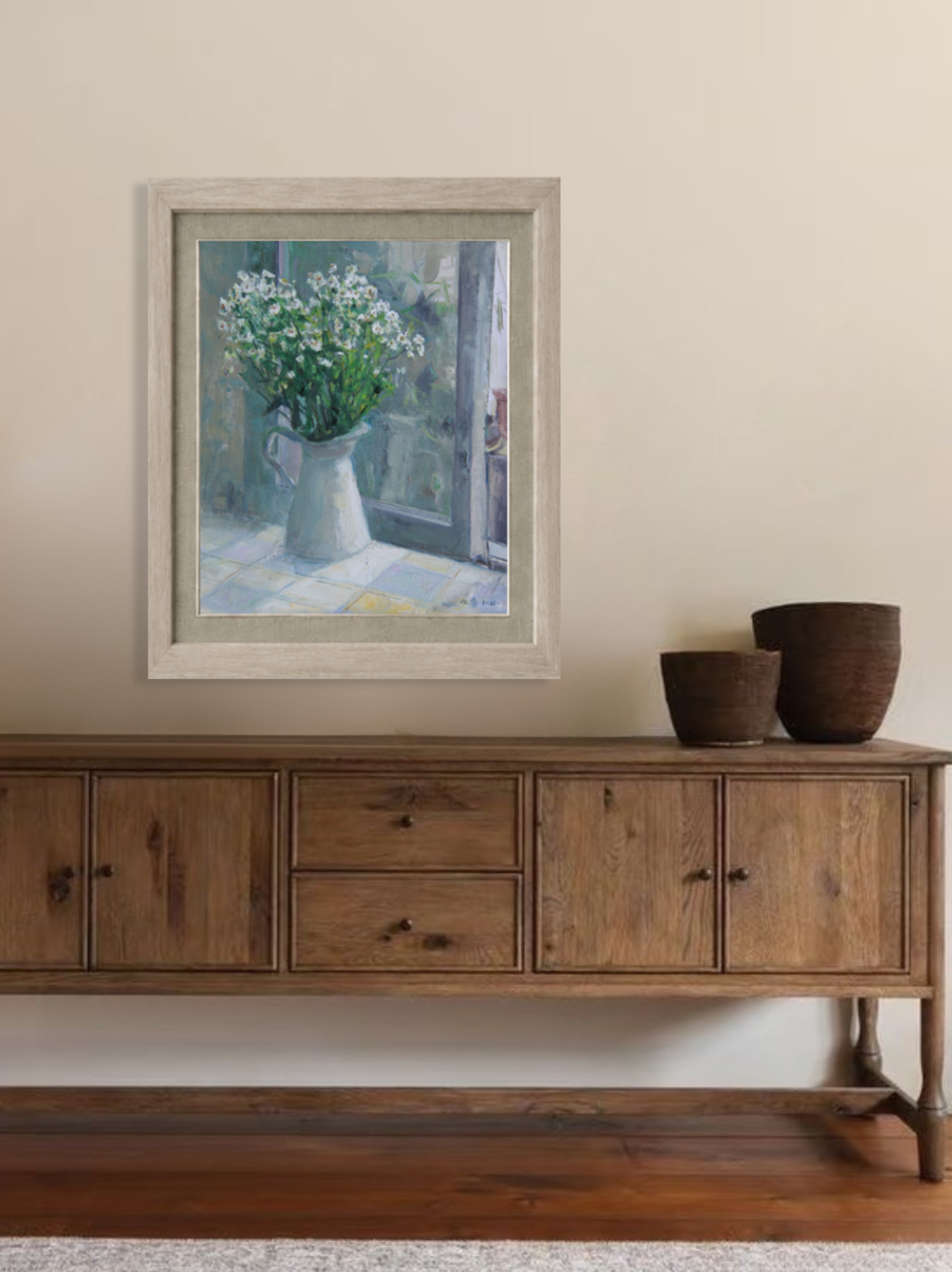 Framed oil painting featuring white flowers in a ceramic pitcher displayed by a window, creating an airy and serene visual focal point for interior décor.