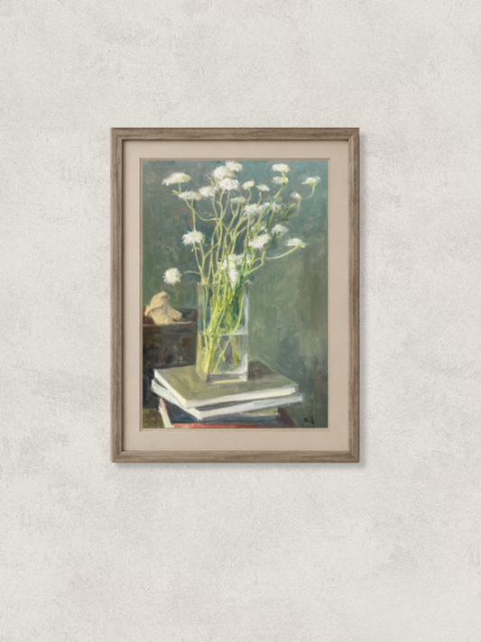 Original oil painting featuring delicate white flowers arranged in a transparent glass vase, placed atop a stack of books with a small decorative object. Painted by Hua Xi Yang with soft natural light and muted background, creating a calm still life composition.