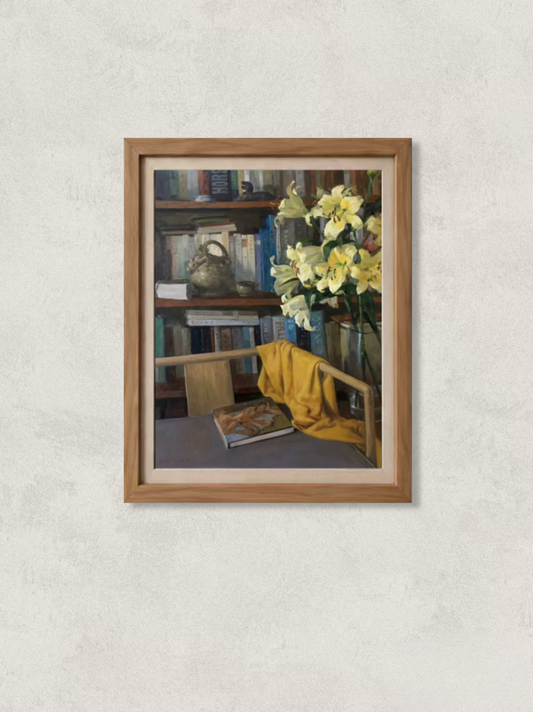 Original oil painting featuring yellow lilies arranged beside books and a ceramic vessel in a cozy interior still life composition. Painted by Hua Xi Yang with warm tones and refined brushwork.