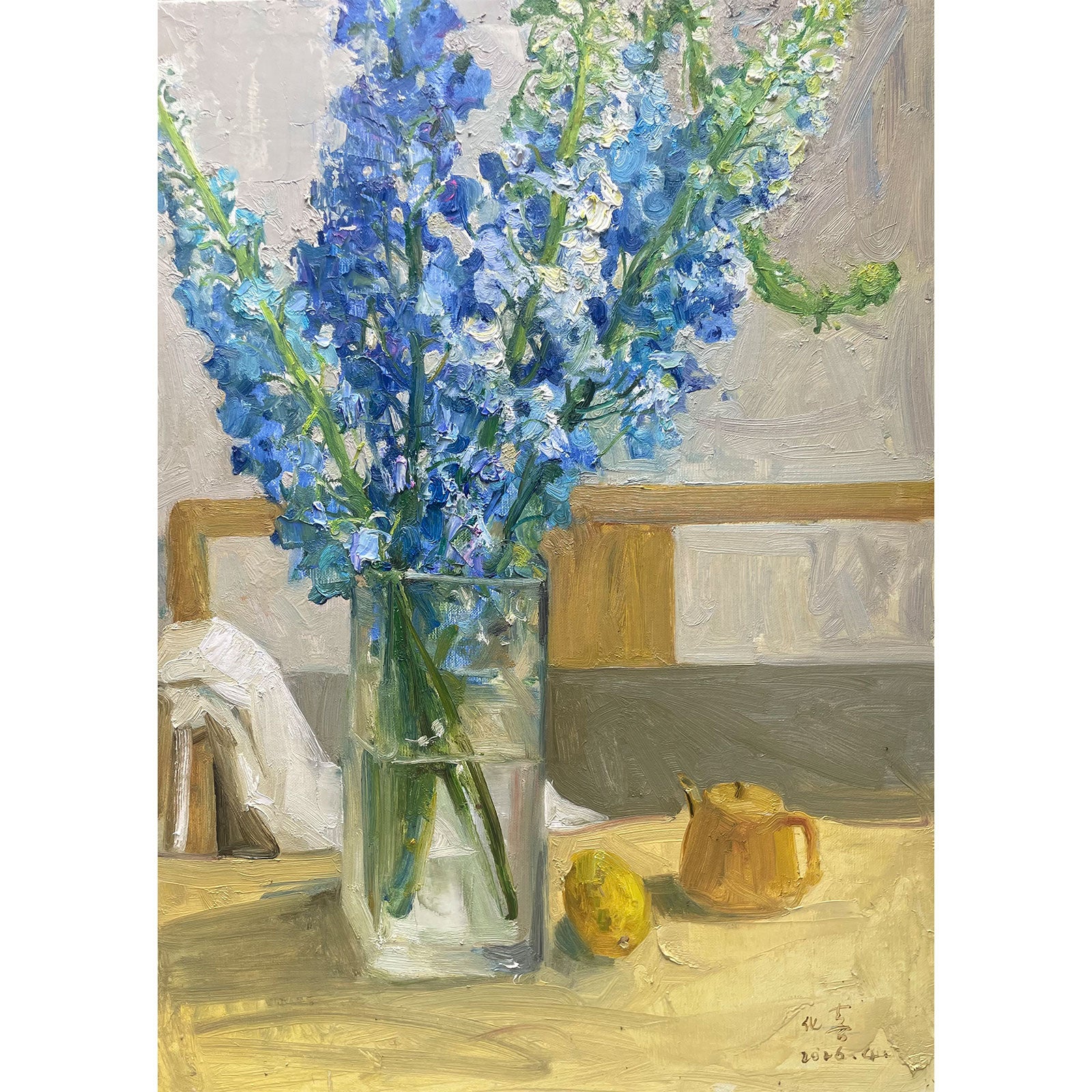 Original oil painting of blue flowers in a glass vase with a lemon and soft background