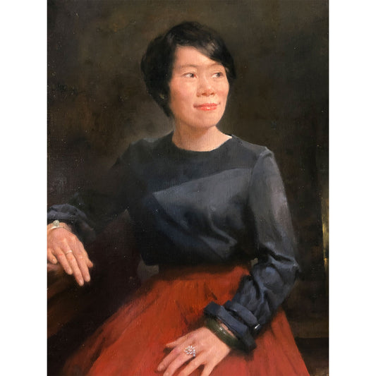 female portrait oil painting of seated woman with red skirt and soft light