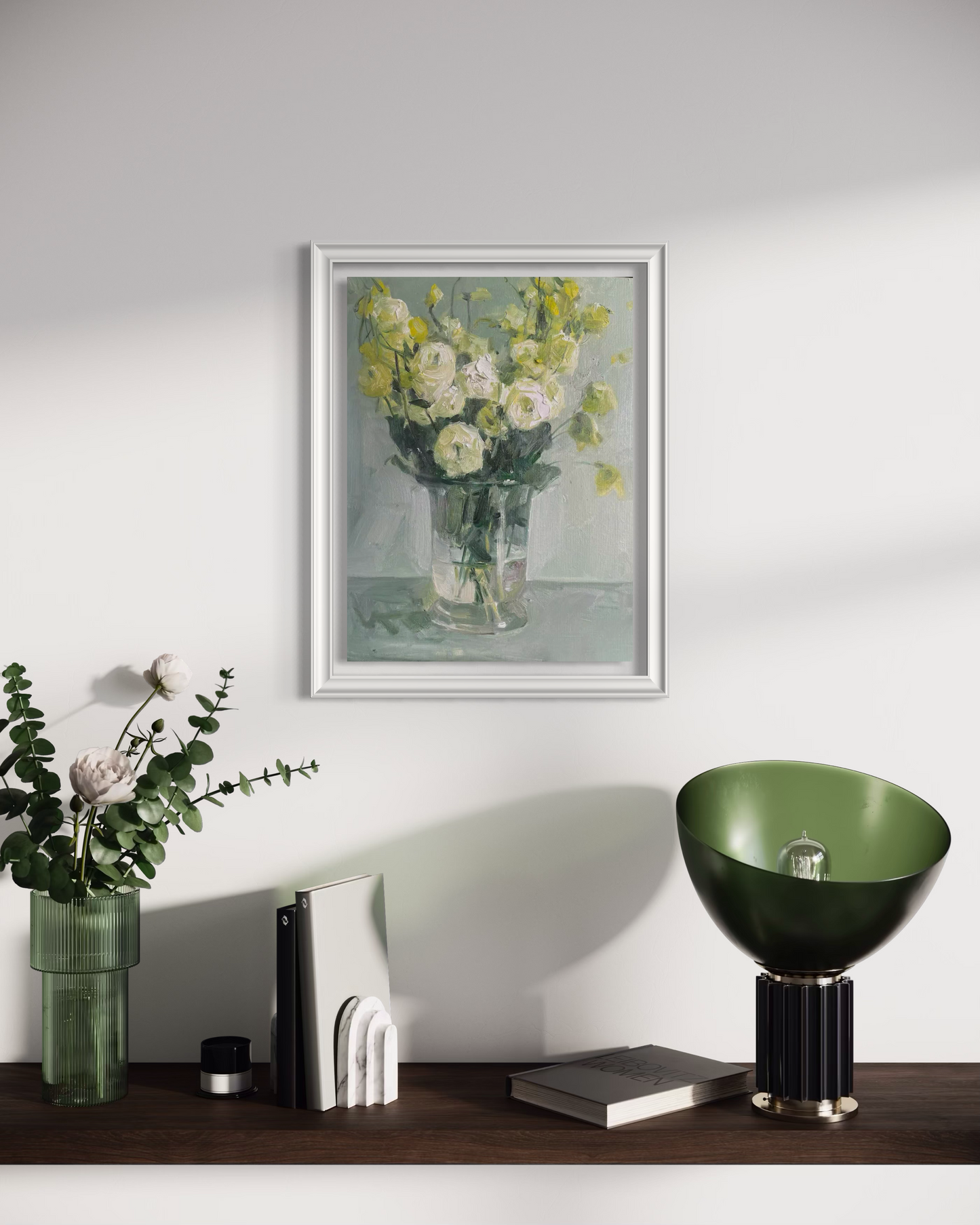 Framed floral still life painting displayed on wall in modern home interior decor