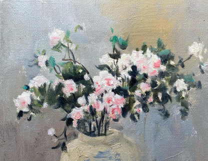 Original floral still life painting featuring pink and white blossoms arranged in a ceramic vase against a soft neutral background.