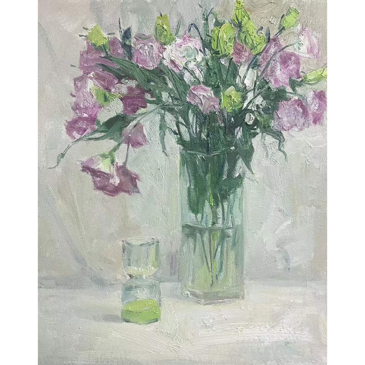 Original oil painting of pink flowers in a glass vase with a minimal neutral background and glass cup