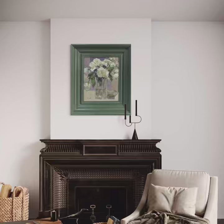 Short reel featuring an original oil painting of white flowers presented across multiple interior scenes. The video highlights the green frame, painterly details, and the quiet atmosphere the artwork brings into living spaces.